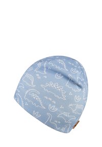 Light blue beanie with white dinosaur patterns. Soft material, rounded shape, and small brown label detail. Designed for warmth and comfort.