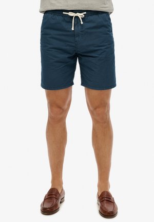 Mørkeblå shorts lavet af letvægtsstof, med elastisk talje og snøre. Glat tekstur, knælangt design, uden synlige mønstre.