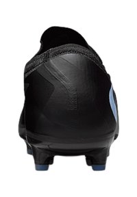 Black soccer cleat with a blue Nike swoosh visible on the side, shown from the rear with studded sole for traction.