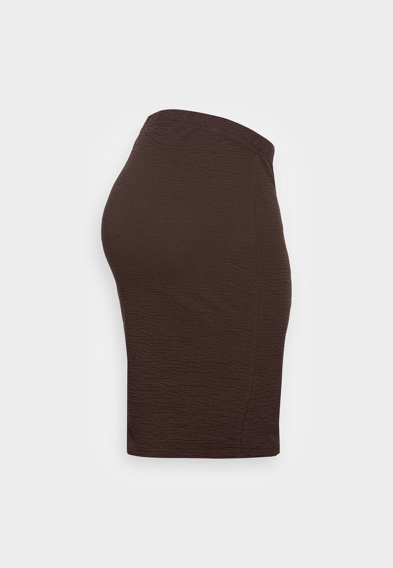 Ruskea ribattu hame, jossa on joustava vyötärö, muotoonleikattu siluetti ja teksturoitu kangas. Sivunäkymä näyttää suppilomaisen muotoilun.