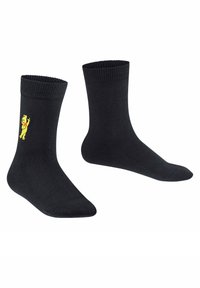 Schwarze Baumwollsocken mit einem gerippten Bündchen und einer gelben Figur, die an der Seite gestickt ist. Sie haben eine glatte Textur und sind knöchellang.