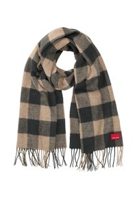 Wollen sjaal in zwart en beige ruitpatroon met franjes aan de uiteinden. Rode label met merknaam zichtbaar aan één kant. Zachte textuur.