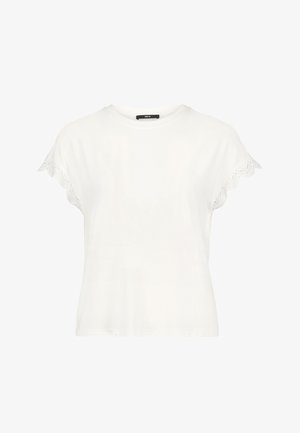 Biela blúzka s krátkym rukávom, okrúhlym výstrihom a ozdobnými čipkovými detailmi na rukávoch, na zadnom štítku na golieri označená nápisom "zero".