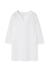 Túnica blanca de lino con escote en V y borde de encaje en el cuello y las mangas. Presenta mangas de tres cuartos y un corte holgado.
