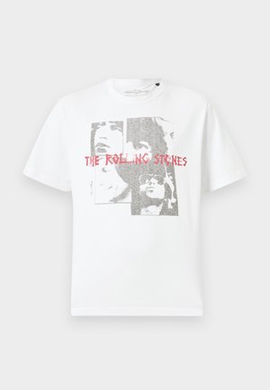 White cotton T-shirt featuring a graphic print of faces and the text "THE ROLLING STONES" in red. Crew neck and short sleeves.