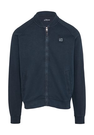 Jūras spēku zip-up jaka ar vienkāršu dizainu, ribota apkakle, piedurknes un apakša, ar mazu logotipu kreisajā krūtī un divām priekšējām kabatām.