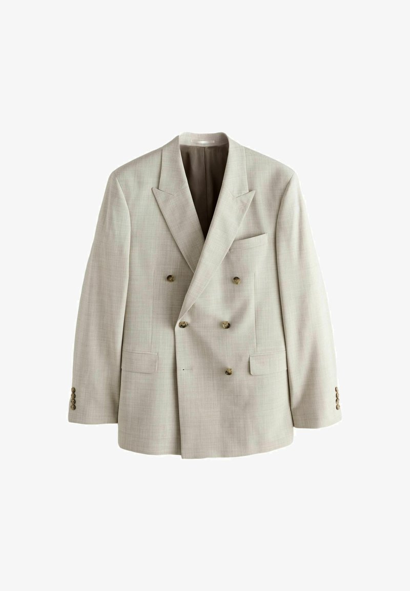 Blazer beige clair à double boutonnage avec revers à pointe, six boutons à l'avant, deux poches à rabat et poignets boutonnés.