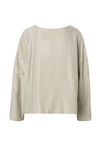 Haut beige à manches longues, coupe ample, avec un col rond et un tissu lisse et simple, présenté sur un fond blanc.