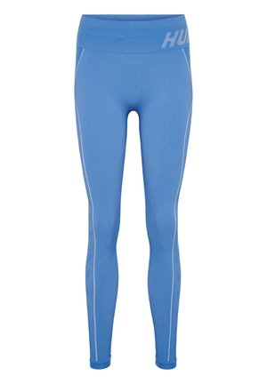Blaue Sportleggings aus geripptem Stoff, mit einem hohen Bund und dem 'HUM'-Logo sowie kontrastierenden weißen Nähten an den Seiten.