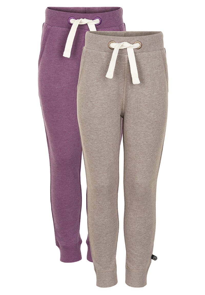 Lila och beige mjukisbyxor med elastisk midja och dragsnören. Mjuk bomullsblandning, tapered passform, ribbade muddar och minimal branding.