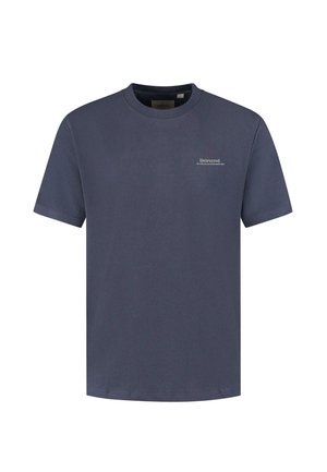 T-shirt en coton bleu marine avec un col rond et des manches courtes. Présente un logo blanc discret sur la poitrine. Texture lisse, coupe décontractée.