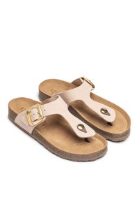 Sandali beige chiaro con una tomaia in pelle liscia, due cinturini, fibbia dorata e una suola in sughero testurizzata con due borchie decorative.