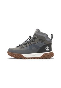 Gray hiking boots with a textured upper, waterproof design, contrasting black accents, and a rugged brown outsole with triangular treads.