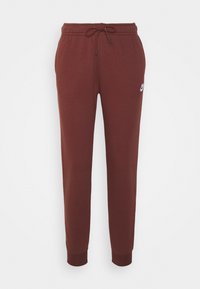 Bordeauxfärgade sweatpants med elastisk midja, justerbar dragsko och avslutade anklar. Har en liten vit Nike-logotyp på v änster lår.