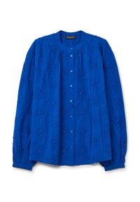 Camicia in cotone blu con colletto rotondo, chiusura a bottoni sul davanti e maniche lunghe. Presenta un ricamo floreale testurizzato su tutta la superficie.