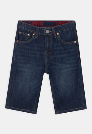 PERFORMANCE - Shorts vaqueros - dark blue denim