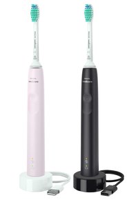 Due spazzolini elettrici in rosa e nero, con manici curvi, setole multicolori e basi di ricarica; cavi USB inclusi.