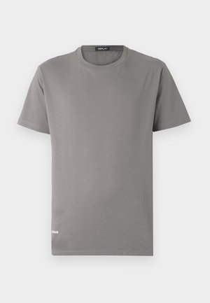 T-shirt cinza de manga curta feito de algodão suave com decote redondo. Apresenta um pequeno detalhe impresso em branco na bainha.