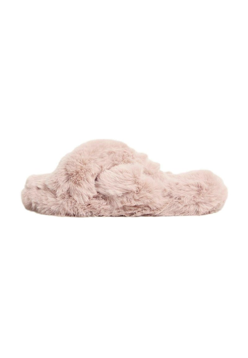 Rosa, fluffiga tofflor med rund form, mjuk textur och sömlös design. Mjuka, dekorativa detaljer synliga på toppen.
