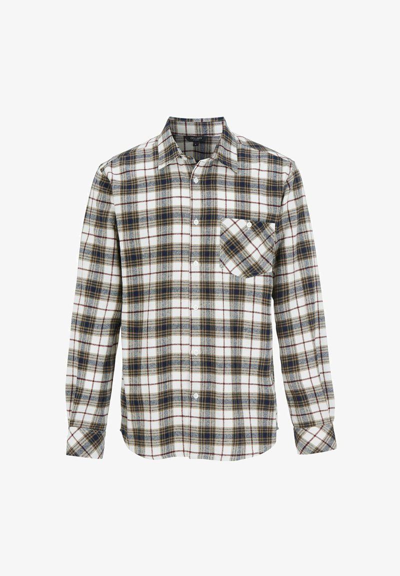 Langarm geruite blouse in wit, marineblauw en kastanjebruin, gemaakt van flanelstof. Bevat een enkele borstzak en een knopenlijst aan de voorkant.