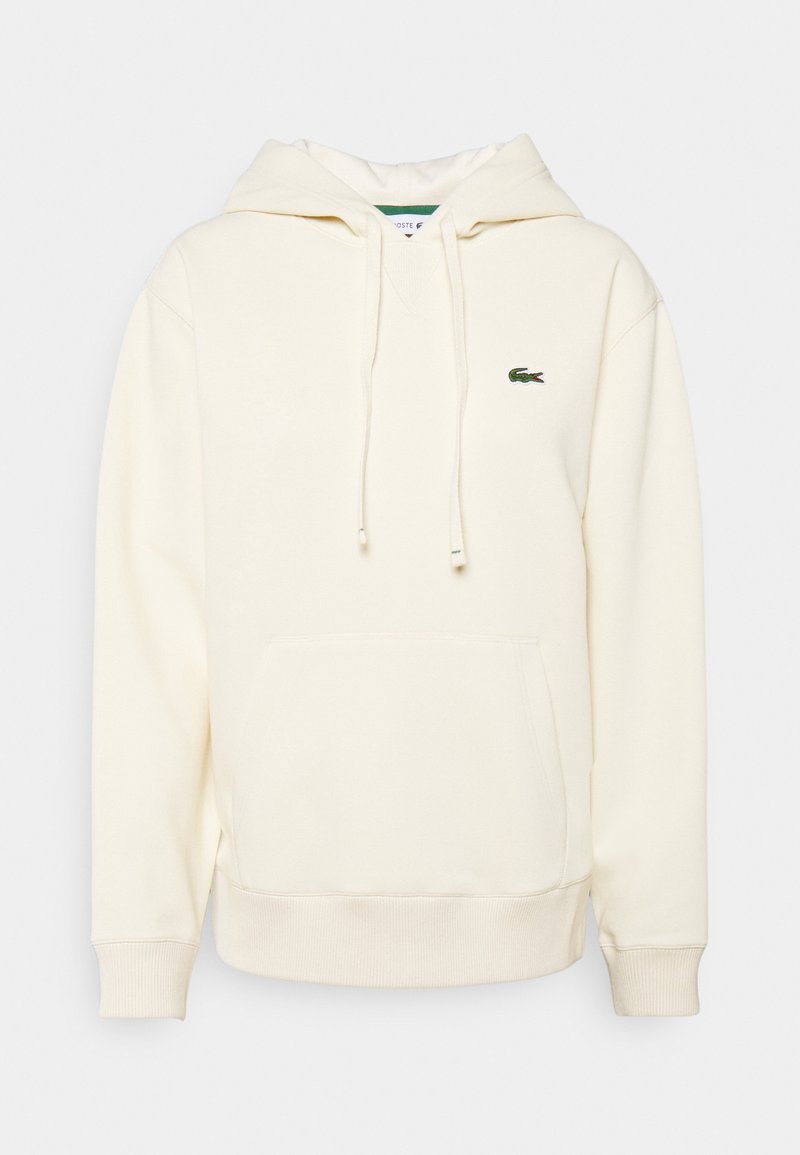 Sweat à capuche blanc cassé avec poche avant, cordon de serrage à la capuche, poignets et ourlet côtelés, et petit logo crocodile vert sur la poitrine.