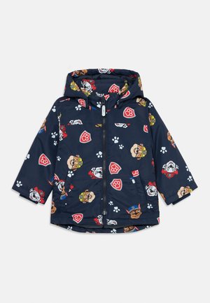 Navy blue padded jacket featuring a hood, decorative cartoon animal patterns, and paw prints. Front zipper with two side pockets.
