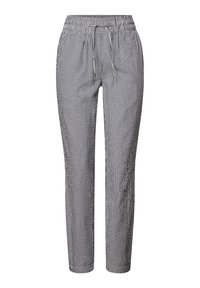 Pantalons de jogging rayés avec taille élastique et cordon de serrage ajustable. Fabriqués en tissu léger avec des rayures verticales noires et blanches.