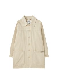 Veste beige à manches longues avec boutons, col et deux poches avant, présentée sur un fond blanc.