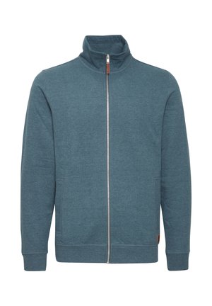 Ziphoodie i teal, tillverkad i mjukt material. Har hög krage, långa ärmar och två sidofickor. Minimalistisk design utan mönster.