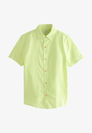 Chemise à manches courtes, vert clair, boutonnée avec un col et des boutons en bois, présentée sur fond blanc.