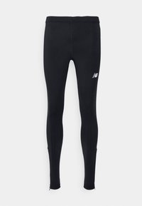 Leggings atléticos negros hechos de tela elástica, con una textura lisa, un corte ajustado y un pequeño logotipo blanco en el lado izquierdo.