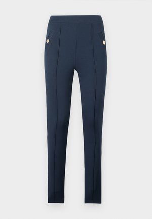 Navy blue slim-fit pants with stitched front seams and angled side pockets, each featuring a single round gold button.