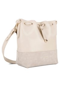 Beige bucket bag med glat læder og suede-detaljer, justerbar rem, snørelukning og hardware i guld-tone.