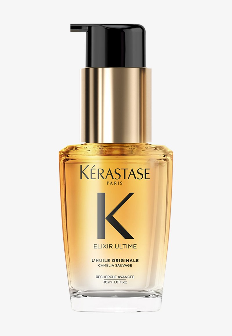 Huile capillaire Kérastase Elixir Ultime, 30 ml. Flacon en verre transparent avec un pulvérisateur doré et noir. Liquide ambré ; étiquette avec texte noir en gras.