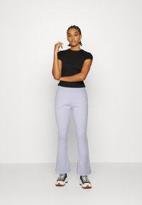 Nike Sportswear TREND - Calças de fato de treino - pure violet