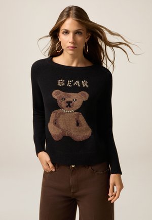 CON CASTONI - Pullover - nero