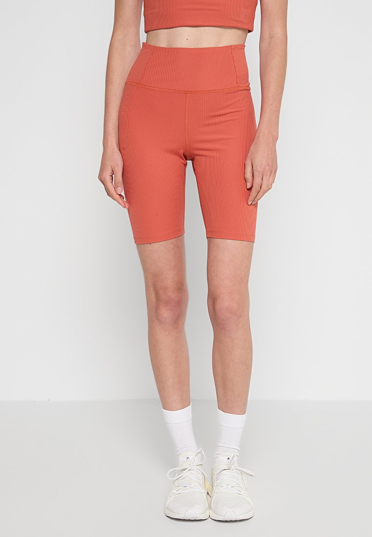 Girlfriend Collective Tights koraalrood