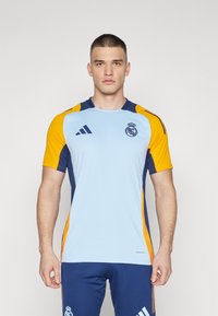 adidas Performance REAL MADRID 24/25  JERSEY - Klubska moštva - glow blue/crew orange/team navy blue