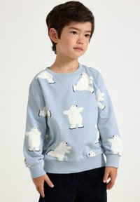 Hellblaues Sweatshirt mit weißen Illustrationen von Eisbären und schwarzen Akzenten. Weicher Stoff mit gerippten Bündchen und Saum.
