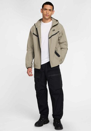 Nike Sportswear TECH WOVEN - Cortaviento - light army light army black