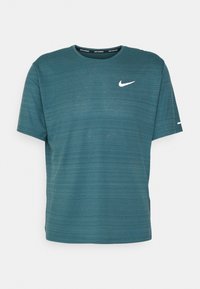 Teal short-sleeve Nike running shirt with subtle horizontal stripes and white Nike swoosh logo on left chest, displayed on white background.