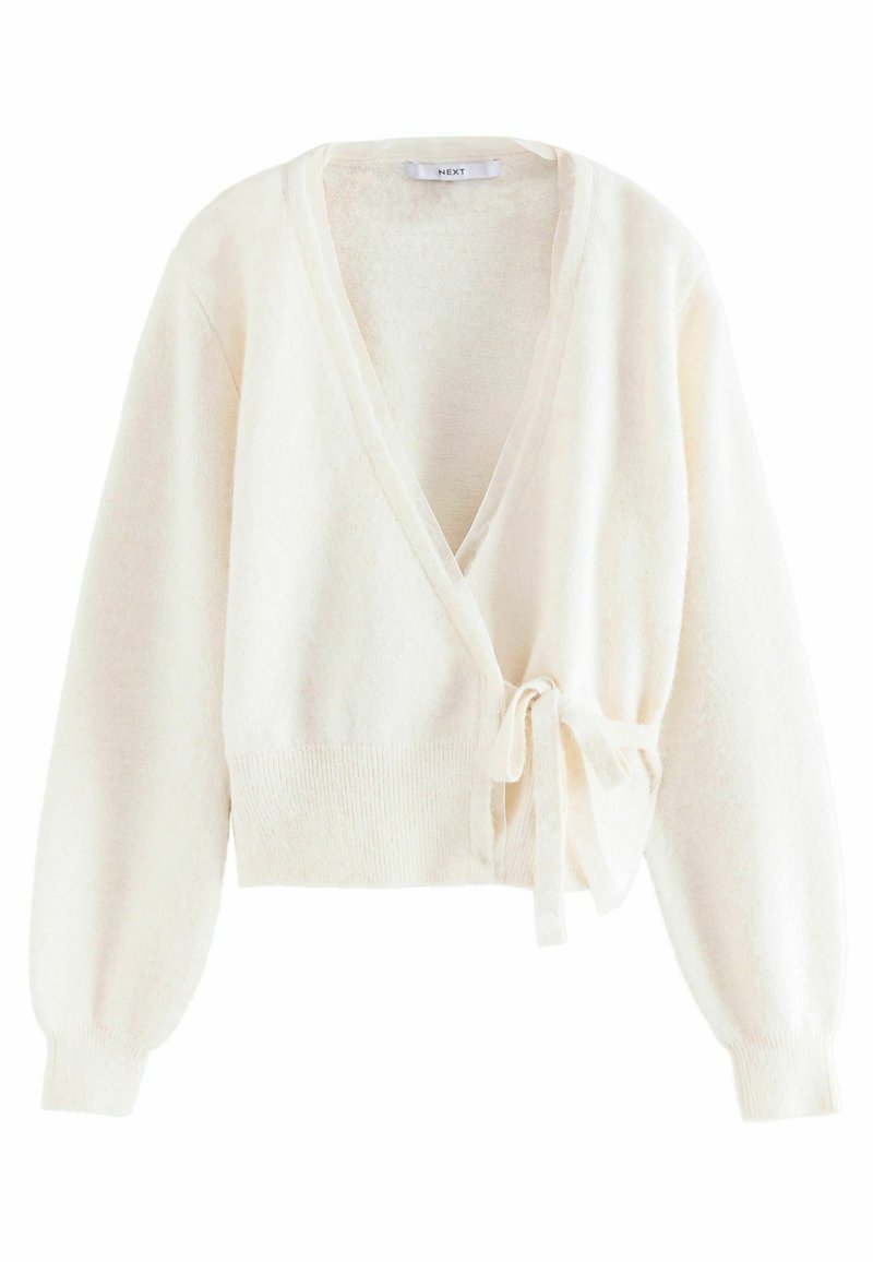 White, soft wrap sweater with long, balloon sleeves. Features a v-neck, tied waist, and ribbed hem. Cozy texture for warm layering.