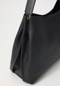 PARFOIS Sac à main - black