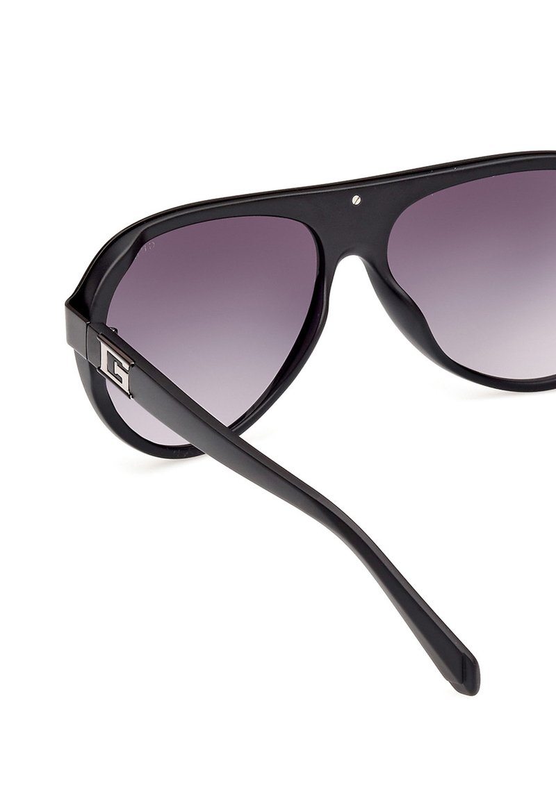 Guess INIETTATO Lunettes de soleil nero opaco grigio fumo