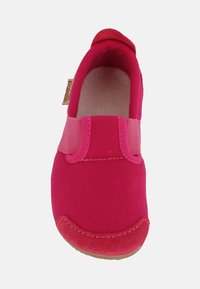 Bright pink slip-on shoe with canvas upper, rubber sole, and elasticized side panels for ease. Suede-like front with stitched detailing.