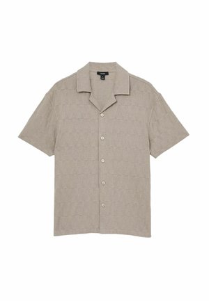 Chemise beige à manches courtes avec boutons, motif tricoté triangulaire texturé et col plié.