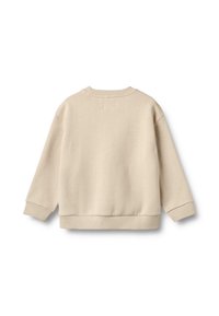 Sudadera beige de corte relajado, cuello redondo y mangas largas. Textura suave, puños y dobladillo de canalé. Diseño simple y minimalista.
