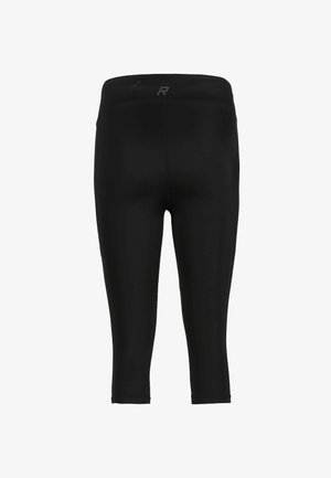 Czarne sportowe krótkie legginsy z wysokim stanem i małym odblaskowym logo na środku tylnej części pasa.