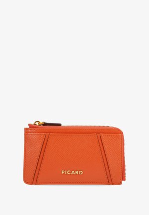 Orange leather wallet with a textured finish, featuring a zip closure and gold-tone hardware. The front displays a raised logo.