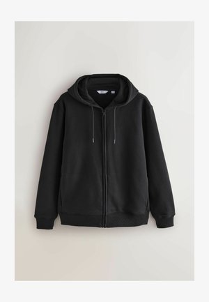 Mustrella mustriga musta kapuutsiga, tehtud pehmest kangast, koos avara kapuutsi, nööride ja soonilise varrukate ning allääriga, ilma nähtavate logodeta.